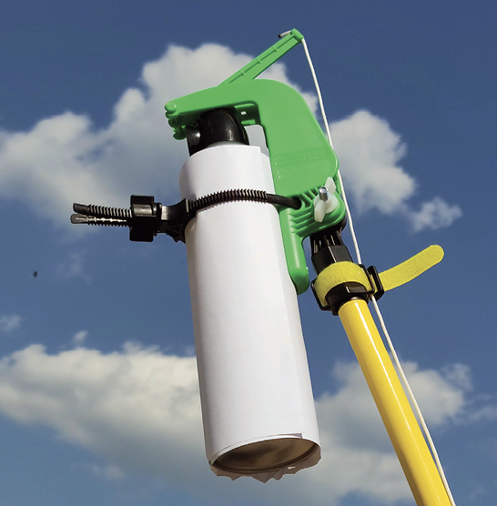 Closeup of a sprayer mounted on a pole.
