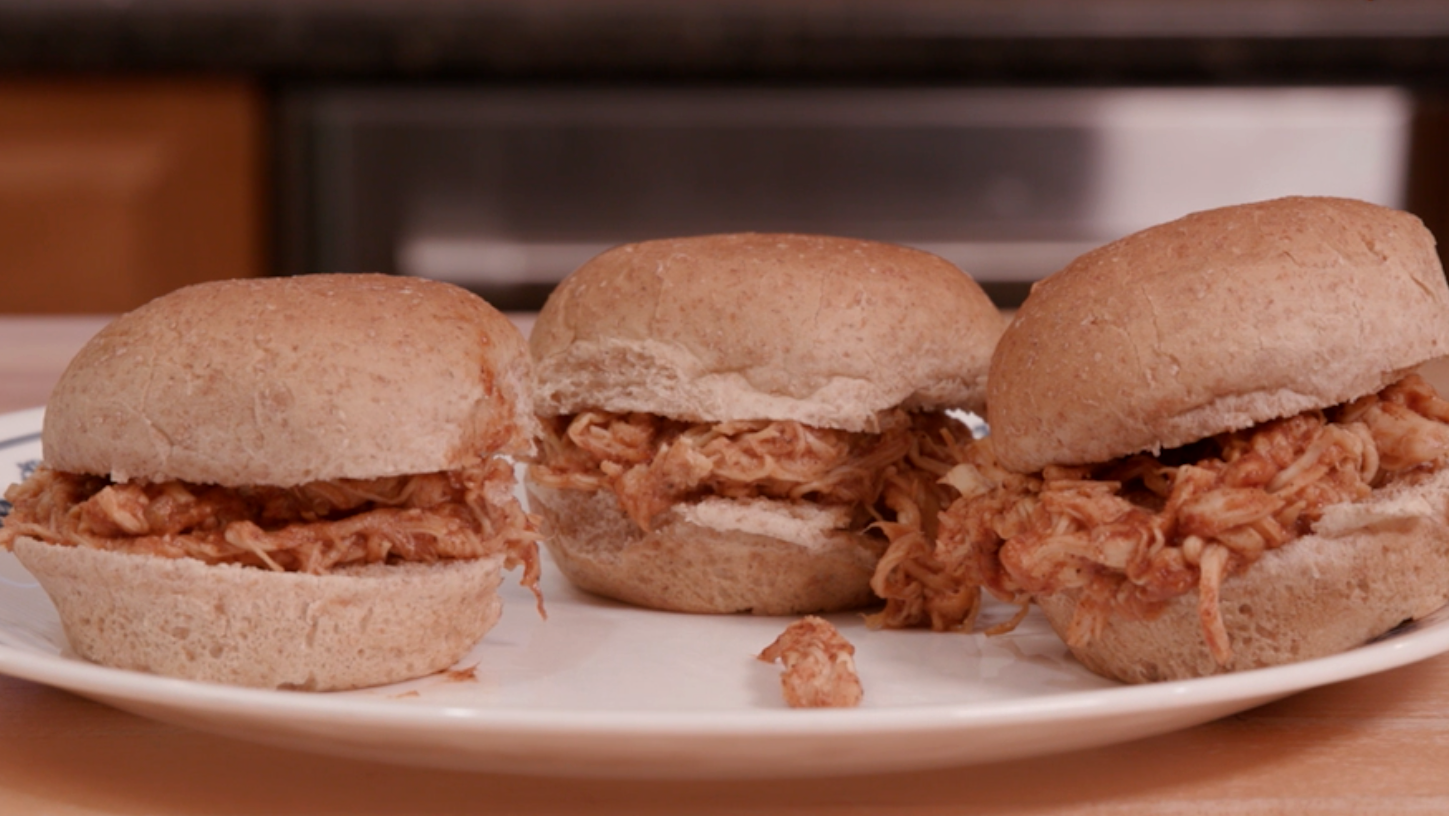 Barbecue chicken sliders on wheat buns