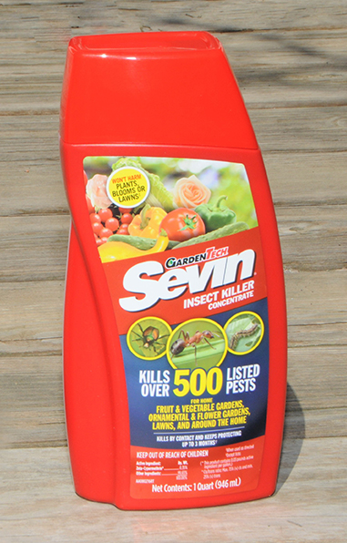 red bottle of Sevin insect killer.