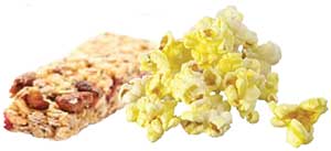 An image of grains - granola bar and popcorn.