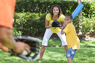 family playing ball.