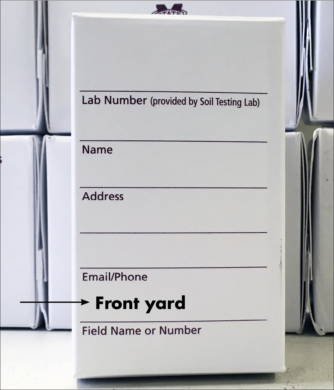 A soil sample box with "front yard" as the field name.