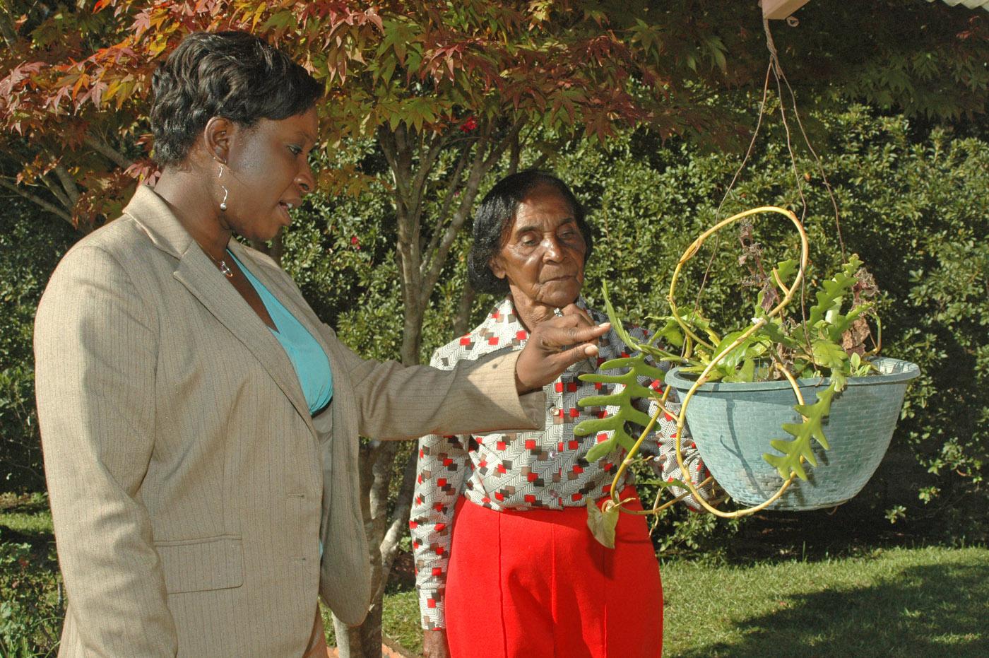 Newton County Extension 4-H agent Katrina McCalphia, left, and volunteer leader Johnnie Mae Walker have worked together on many projects that develop leadership skills of youth and provide opportunities for community service. (Photo by Patti Drapala)