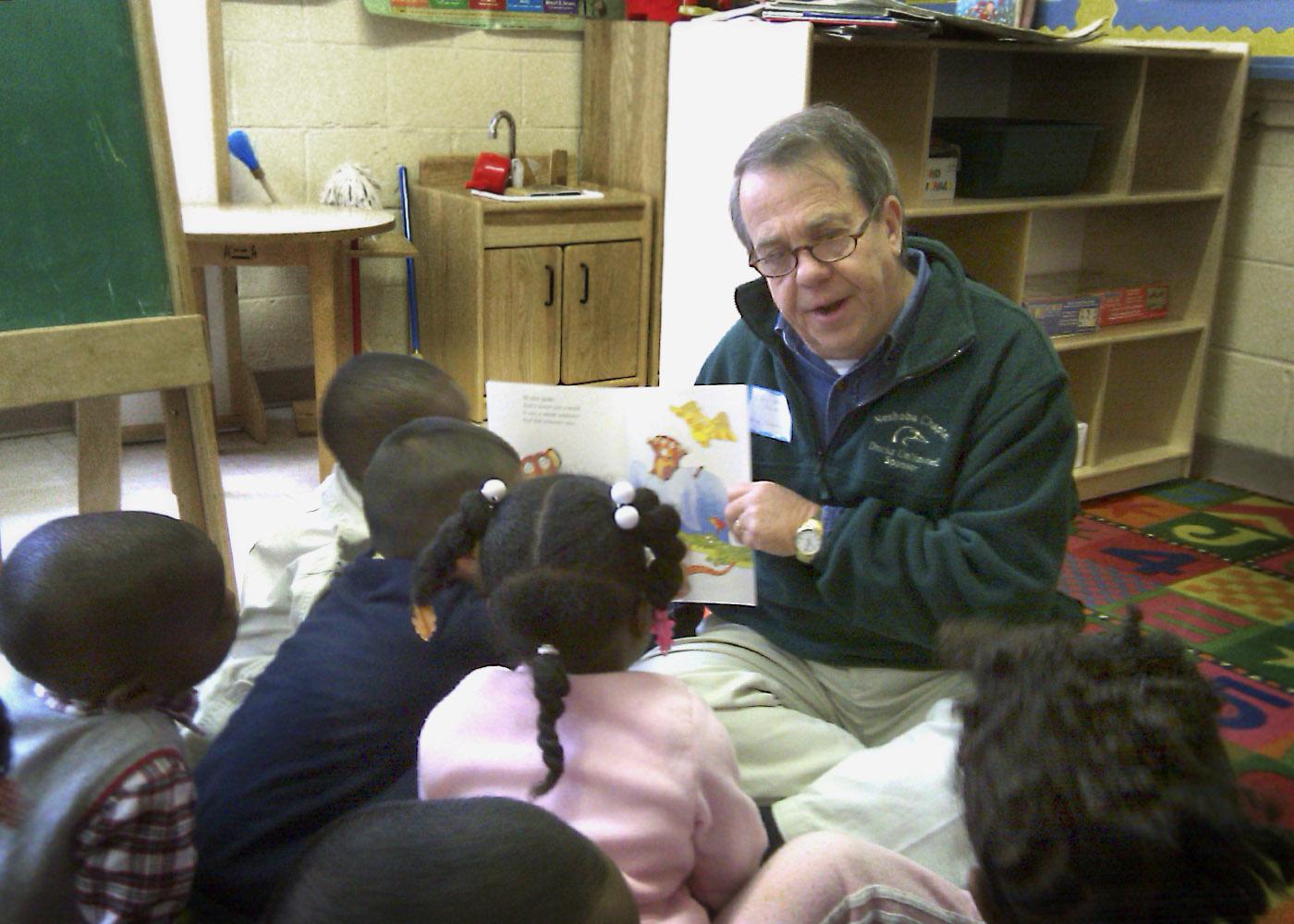 Mississippi Sen. Giles K. Ward reads "Leo the Late Bloomer" to Head Start students as a Neshoba County Preschool Literacy Project volunteer. (Submitted photo)