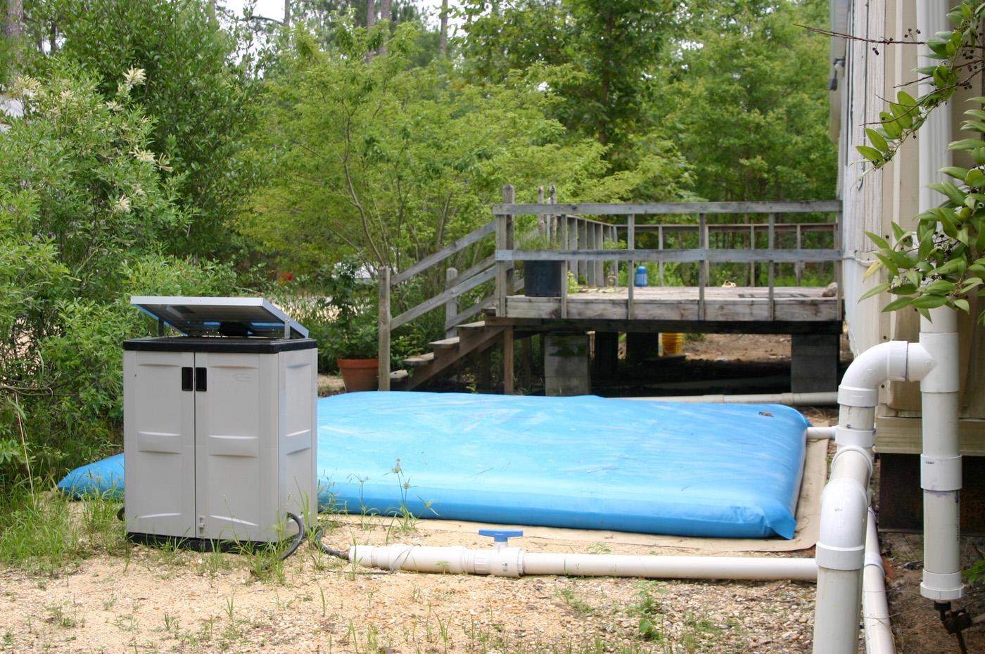A rainwater harvesting system donated to the Crosby arboretum by Avon Engineered Fabrications collects run-off in a flexible storage tank. (Submitted photo.)