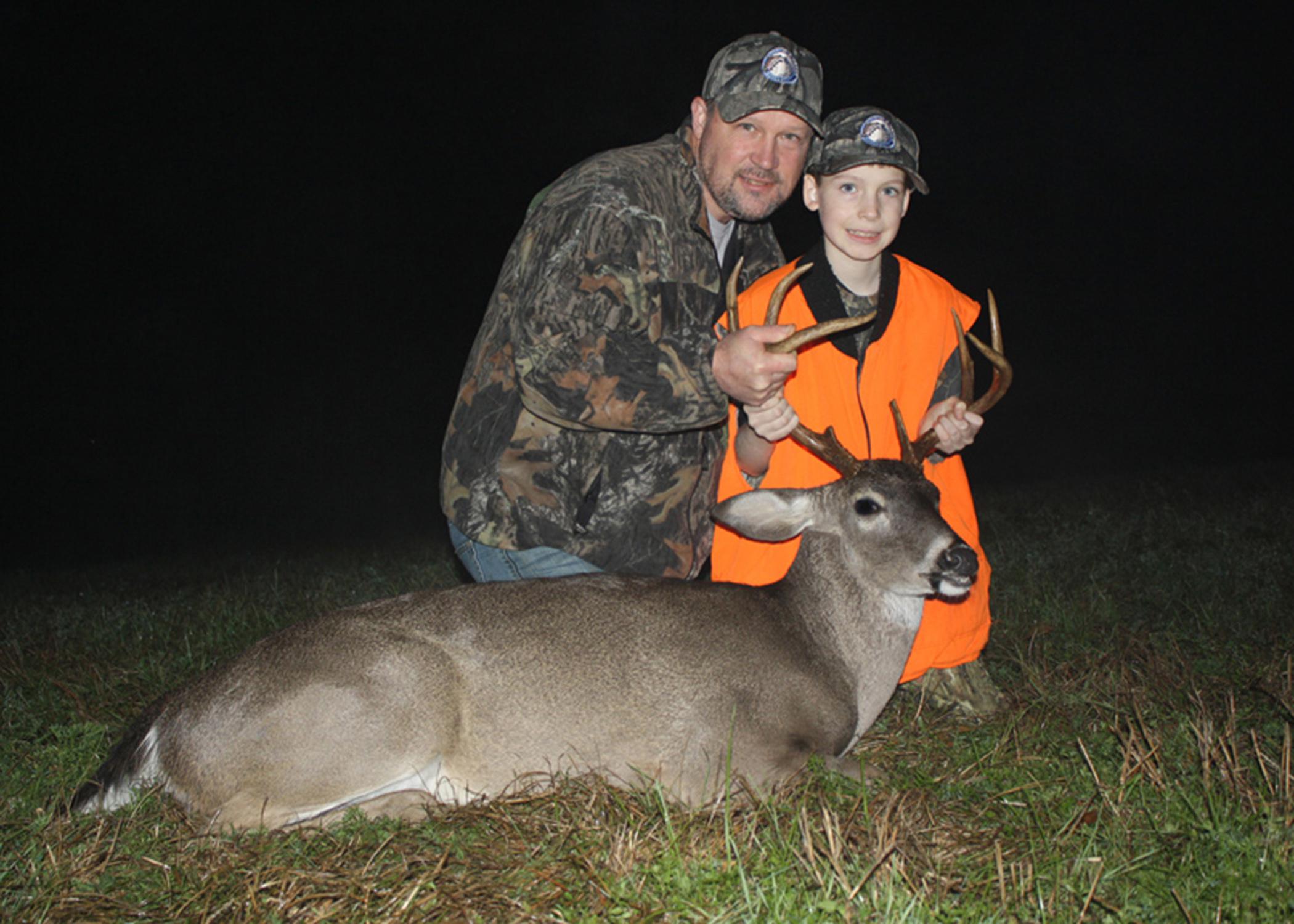 Jacob of West Virginia, pictured with his dad, Jeff, sported the required minimum of 500 inches fluorescent orange for visibility and safety when he got his first-ever whitetail deer during his Catch-A-Dream hunt in Monticello, Mississippi. The Catch-A-Dream Foundation provides outdoor experiences for children with life-threatening illnesses. (Photo courtesy of the Catch-A-Dream Foundation)