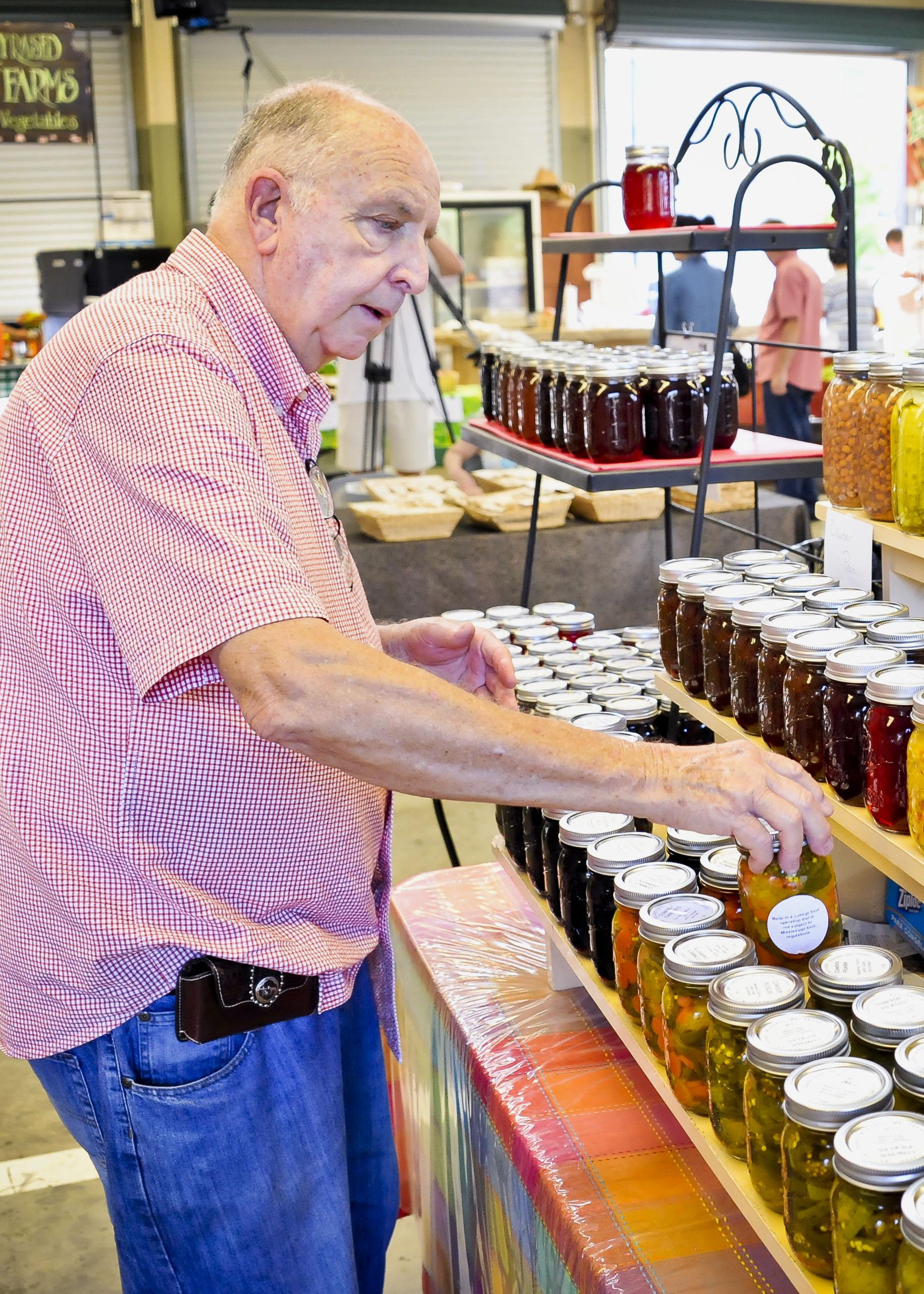 Claude Jones of Brandon sells canned and baked goods at the Mississippi Farmers Market in Jackson made in his home-based business, Old Fashioned Taste. (Photo by MSU Ag Communications/Scott Corey)