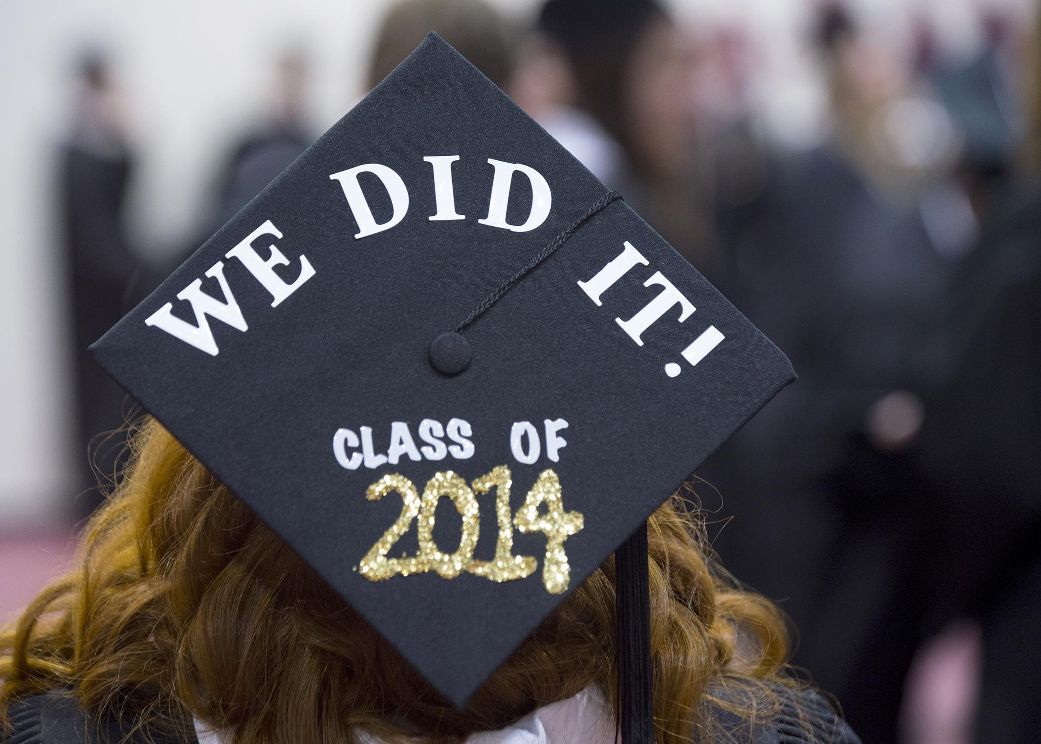 A graduate celebrates at the Mississippi State University spring commencement ceremony in May at the Humphrey Coliseum in Starkville, Miss. (Photo by MSU Office of Public Affairs/ Russ Houston)