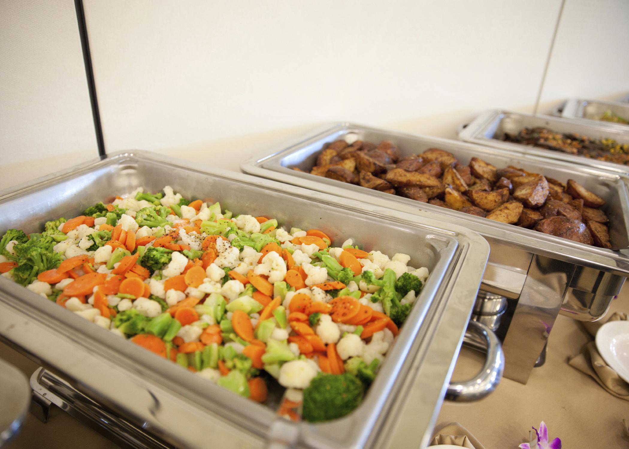 Keeping hot and cold foods at the proper temperatures during a wedding reception is essential for maintaining food safety and quality. (Photo by iStock)