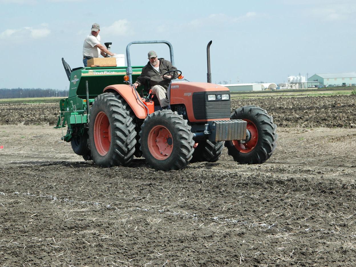 Scott Lanford and Sanfrid Shaifer planted rice March 7 at Mississippi State University's Delta Research and Extension Center in Stoneville. (Photo by Rebekah Ray)