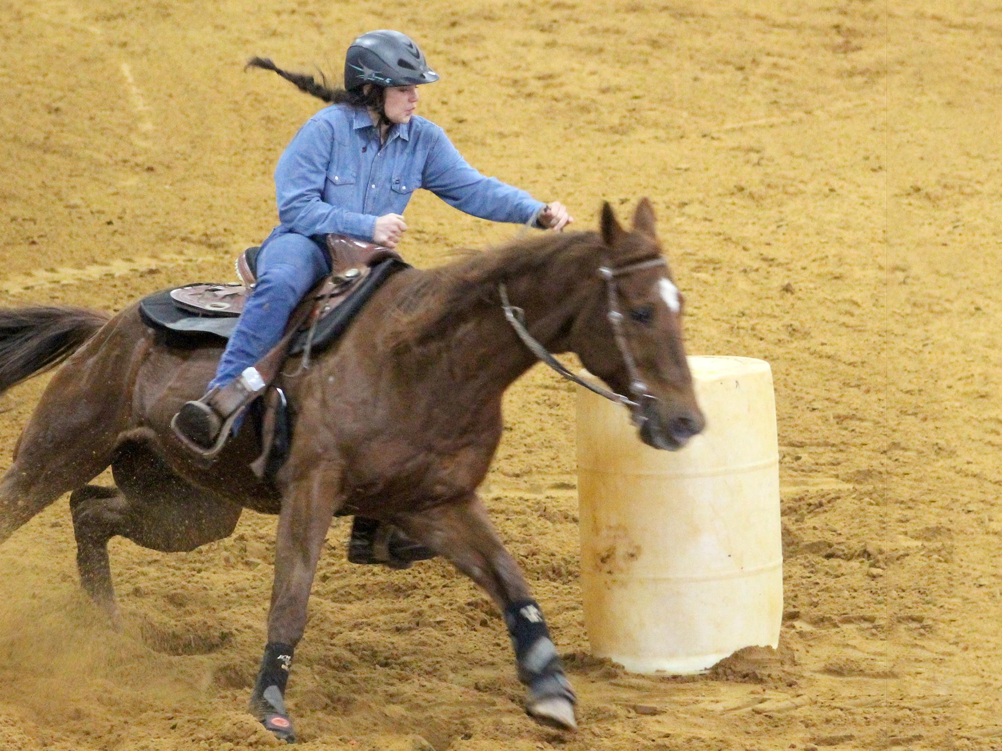 Anna Katherine Hosket, a member of the Mississippi State University Extension Service 4-H program in Choctaw County, runs barrels in the 2017 4-H Winter Classic horse show series. Show organizers and participants celebrated the event’s 10th anniversary on March 31. (Photo courtesy of Gina Wills)