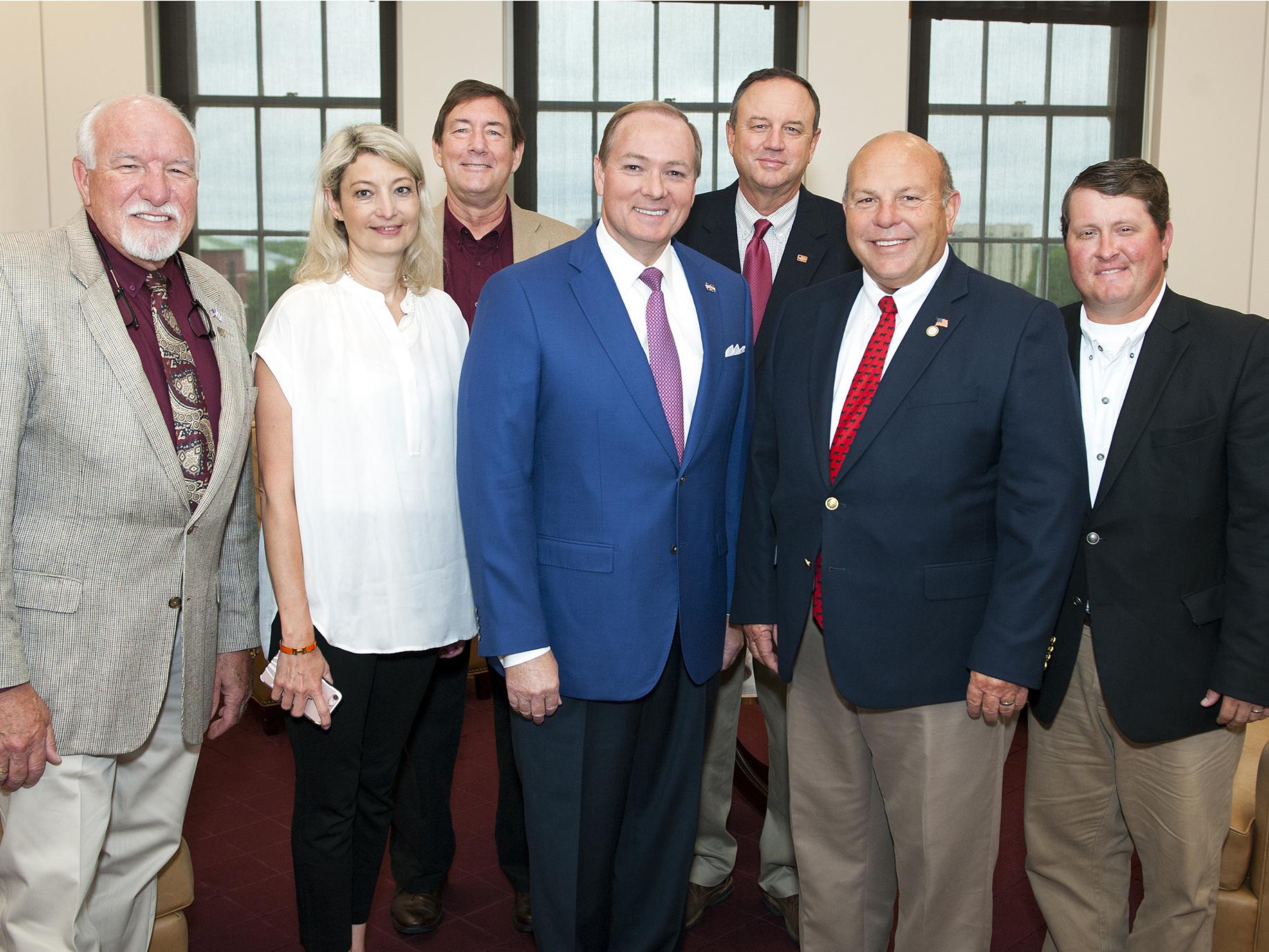 AFBF Group: Mississippi State University President Mark E. Keenum, center, met with American Farm Bureau Federation President Zippy Duvall, second from right, June 21 in Starkville, Mississippi. Duvall visited MSU for meetings with university leaders and tours of campus facilities. The meeting also included, left to right, MSU Associate Vice President for the Division of Agriculture, Forestry and Veterinary Medicine Bill Herndon; AFBF Director of Executive Communications and Projects Lynne Finnerty; MSU Vic