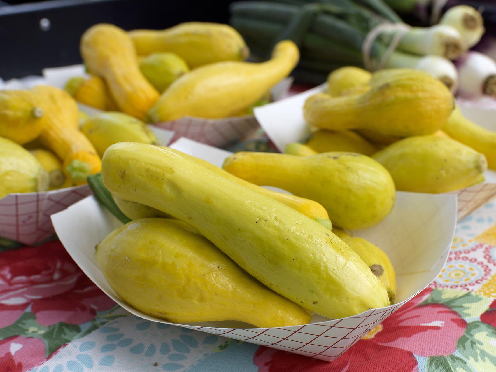 Yellow squash is among the fruits and vegetables available for purchase at the Starkville Farmers Market on May 2, 2017. Early spring temperatures allowed some truck crops producers to plant their fruit and vegetable crops a little early this year. (Photo by MSU Extension Service/Kevin Hudson)