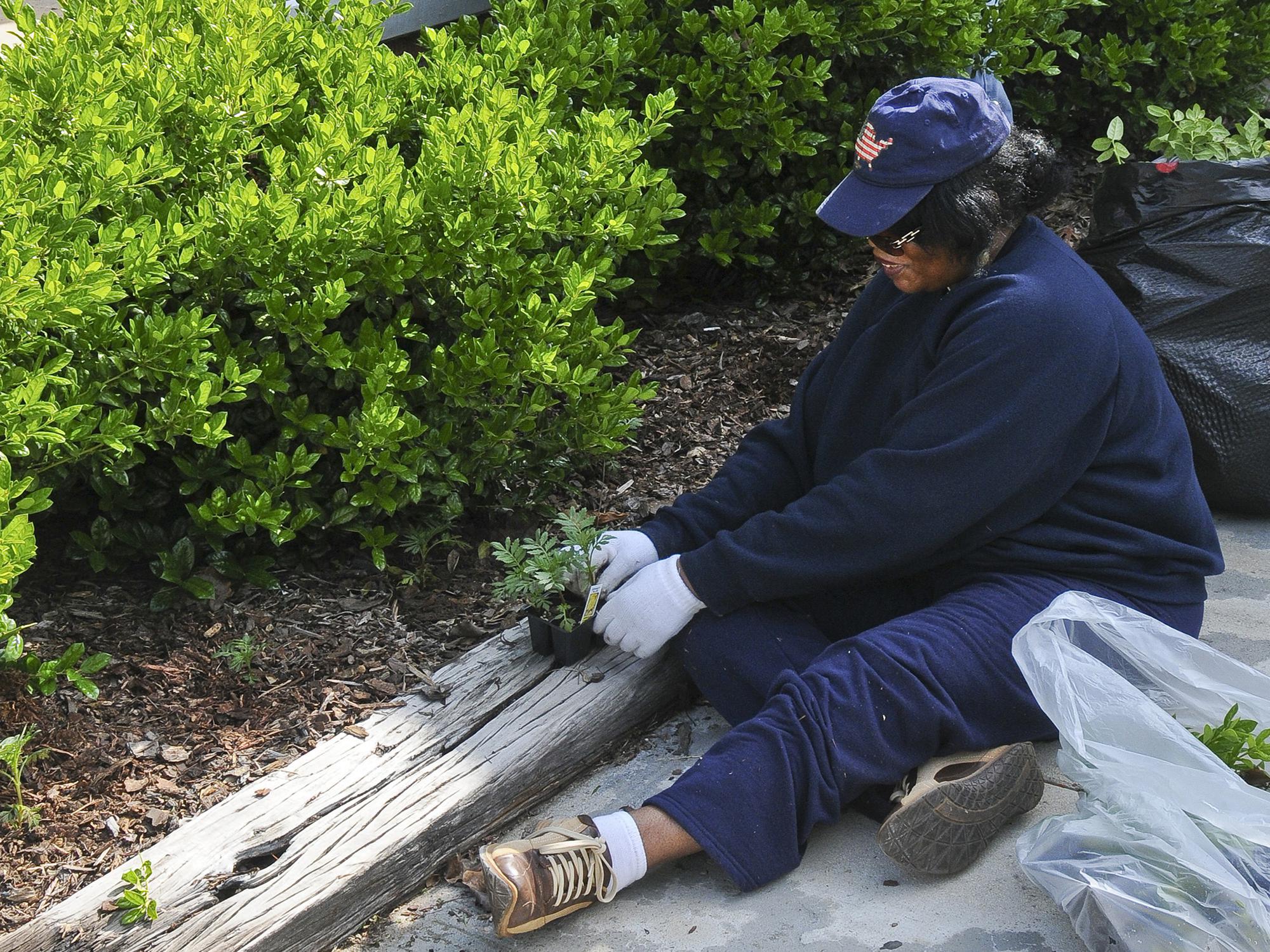 Real gardeners know the work is hard, but they consider sweat equity a reasonable price to pay to be able to enjoy their landscapes. (File Photo by MSU Extension)
