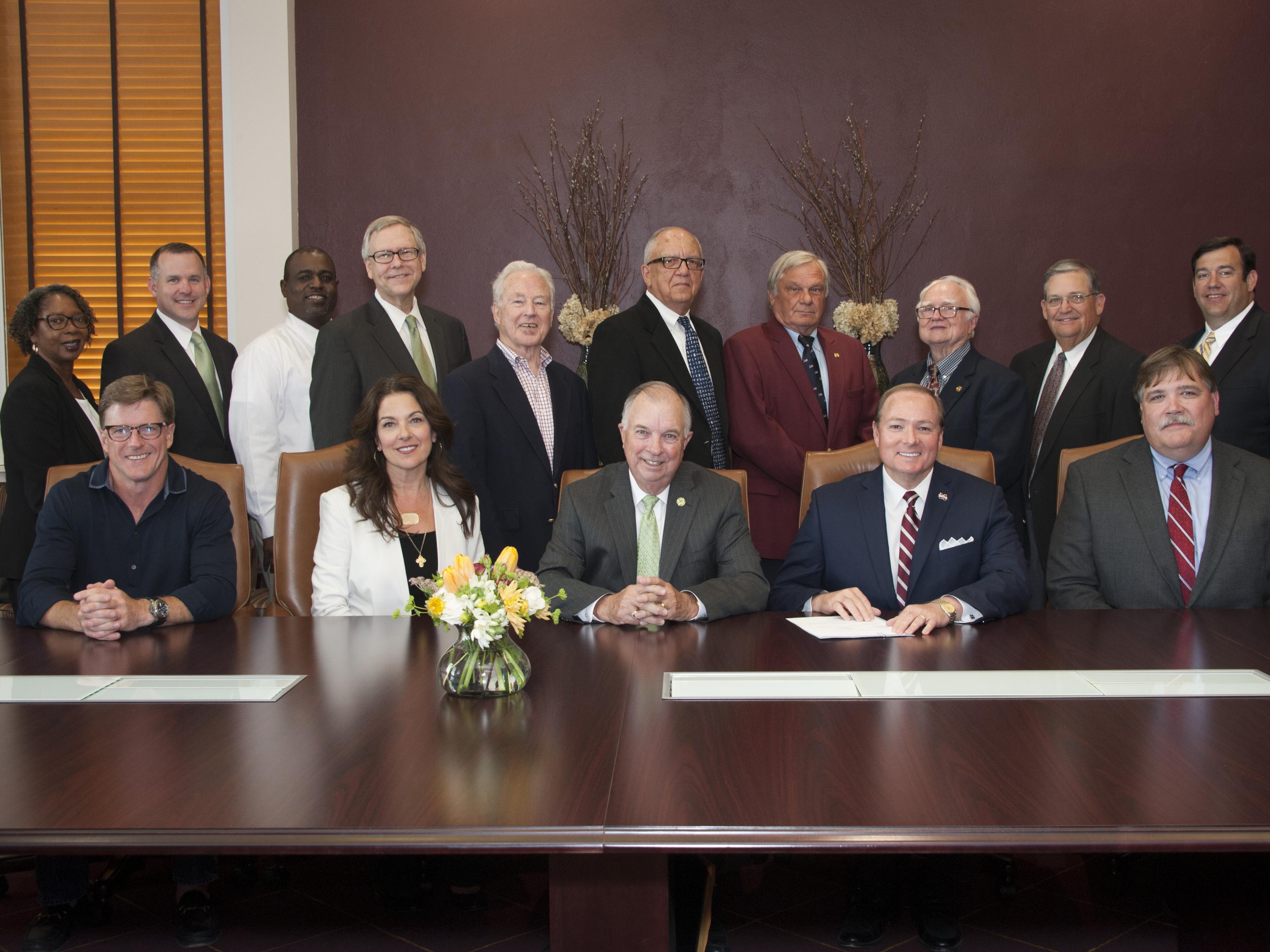 Participants in the Jimmy Bryan 4-H Youth Complex deed transfer ceremony on May 17, 2016, include (front row, from left) Tommy and Brenda Howard, 4-H donors; Harry Dendy, chair of the 4-H Club Foundation of Mississippi; Dr. Mark Keenum, president of Mississippi State University; and Dr. Gary Jackson, director of the MSU Extension Service; and (back row, from left) Dr. Paula Threadgill, associate Extension director; Jud Skelton, director of development for the MSU Foundation; Larry Alexander, 4-H state coord