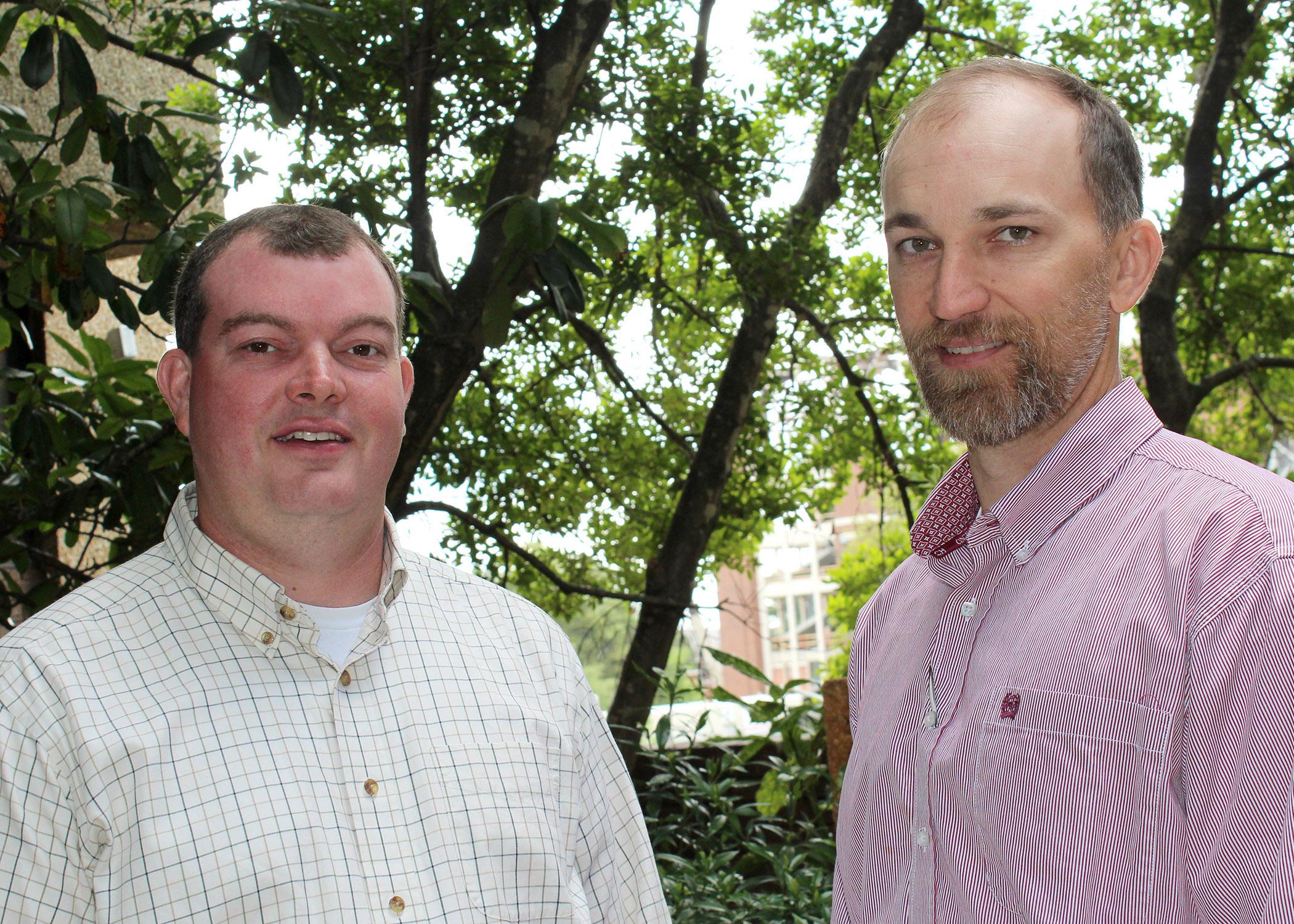 Mississippi State University Extension Service agents Reid Nevins, left, of Lowndes County and Ty Jones of Madison County are a few of the many innovative, young agents who are renewing Extension’s commitment to its motto: “Extending Knowledge. Changing Lives.” As Extension celebrates its 100th birthday, agents across the state continue to provide research-based information to help families, farmers and communities. (Photo by MSU Ag Communications/Keri Lewis)