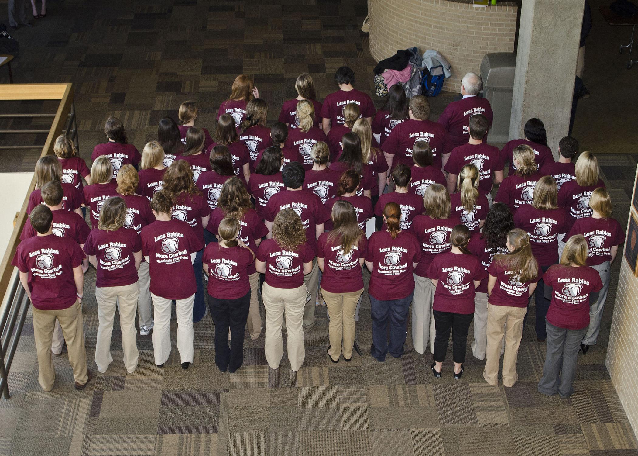 The Mississippi State University College of Veterinary Medicine’s Class of 2016 rings out the rabies prevention message with the tag line, “Less Rabies, More Cowbell.” The class performed several outreach and education projects and won the honor of hosting the annual Merial Rabies Symposium. (Photo by College of Veterinary Medicine/Tom Thompson)