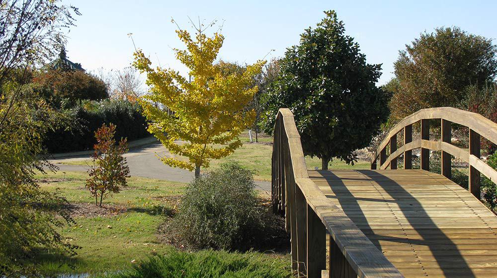 Garden bridge entrance in fall. 