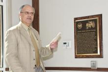 Mississippi State University professor in plant and soil sciences Jac Varco commends the anhydrous ammonia research conducted by professors in the 1930s and 1940s, which changed the face of agriculture and contributed to the formation of the state's first Fortune 500 company, the Mississippi Chemical Corp. (Photo by Scott Corey)