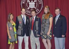 Members of the inaugural team of 4-H shooting sports ambassadors, who were chosen to represent Mississippi at local, state and national events, finish their first year of service this month. From left, Jessica Tedford of Bolivar County; Luke South of Tishomingo County; Logan Raines of Union County; Grace Raymond of Madison County; and John Long, state 4-H shooting sports coordinator. (Photo by MSU Ag Communications/Scott Corey)