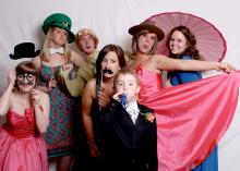 Wedding guests can create a collection of fun memories with a box full of creative props and a willingness to be silly in a photo booth. (Submitted Photo)