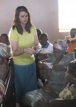 Mississippi State University graduate student Alyssa Barrett hands out moringa seeds to participants of an agricultural education workshop in Ghana. Barrett collected data on the effectiveness of the workshop. (Submitted Photo)