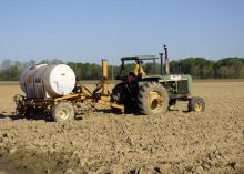 Eddie Stevens, farm supervisor at Mississippi State University’s R. R. Foil Plant Science Research Center in Starkville, was applying a liquid fertilizer to a corn field on April 5, 2016. Correct application of nutrients is a key part of environmental stewardship and efficient farm management. (Photo by MSU Extension Service/Kevin Hudson)