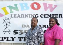 Minerva Graham (left) and Shelia Sanders, co-directors and co-owners of the Rainbow Learning Center in New Albany, receive educational technical assistance and support for school-age children through the Early Years Network, a program of the Mississippi State University Extension Service. This photo was taken Aug. 25, 2016. (Photo by MSU Extension Service/Alexandra Woolbright)