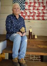 Dawn Morgan manages more than 20 hives at FloBaby Farms and sells raw honey, comb honey and beeswax from her home in Starkville, Mississippi on Nov. 22, 2016. (Photo by MSU Extension Service/Kevin Hudson)