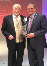 Mississippi State University Extension Service floral design specialist Jim DelPrince, right, accepted the American Institute of Floral Designers Award of Distinguished Service to the Floral Industry from Awards Committee Chairman Rich Salvaggio during the organization’s annual National Symposium in July. (Photo courtesy of American Institute of Floral Designers)