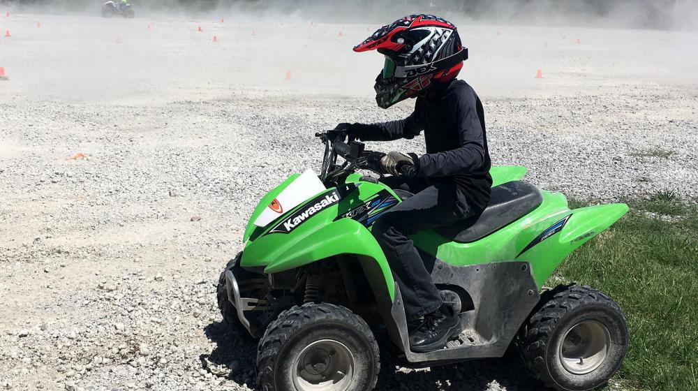 Person on a green ATV