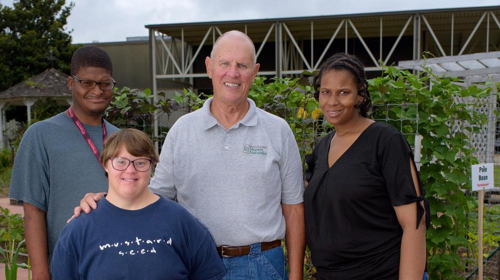 Master Gardener volunteer and gardening participants.