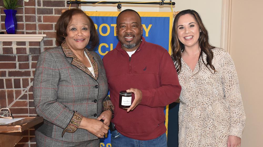Lemon Phelps and Kelsey Martin with Rotary Club of Holly Springs President, Shirley Byers.