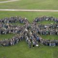 More than 600 4-H'ers gathered on the Mississippi State University campus to create a clover-leaf photograph to celebrate the 100th anniversary of 4-H in Mississippi. The perimeter of the shape was mapped out using GIS and GPS technologies.