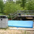 A rainwater harvesting system donated to the Crosby arboretum by Avon Engineered Fabrications collects run-off in a flexible storage tank. (Submitted photo.)