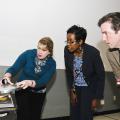 Mississippi State University Extension Service nutrition personnel Pamela Redwine (left) and Brent Fountain, show Lisa Dudley how to test the gauge on a pressure canner. An office associate in Yalobusha County, Dudley and other county support staff members were taught the process so they can meet the needs of clients who come into county offices. (Photo by Scott Corey)