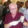 Dr. Skip Jack, Mississippi State University veterinarian, spent three weeks in Nigeria teaching about fish health. Here, he holds a Clarius catfish with some students in Lagos, Nigeria. (Submitted Photo)