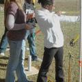Leanne Wagner McGee, Newton County Extension agent, looks on as Nia McCalphia and Jemariaus Ford prepare to shoot arrows at their targets during the Wildlife Youth Day at the Coastal Plains Experiment Station Nov. 16. (MSU Ag Communications/Susan Collins-Smith)