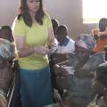 Mississippi State University graduate student Alyssa Barrett hands out moringa seeds to participants of an agricultural education workshop in Ghana. Barrett collected data on the effectiveness of the workshop. (Submitted Photo)