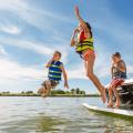 Kids jumping in a lake