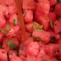Cubed watermelon with spices and fresh mint.