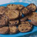 Grilled sweet potato slices on a bright turquoise blue plate