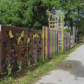 brightly colored wooden fence and gate