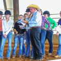Tom McBeath of Union, Mississippi, explains a riding pattern he will judge to a group of young women. McBeath, a long-time volunteer with the Mississippi 4-H Program, is the American Youth Horse Council Adult Leader of the Year. (Photo by Jeff Homan)