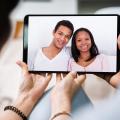 Young couple using digital tablet together