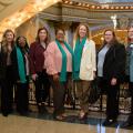 Seven women stand in the Mississippi State Capitol building.