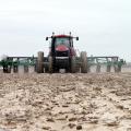 Like jets lining up on a runway, Mississippi growers are ready to take off and resume their planting as soon as the weather allows. Shaifer Bell of Huddleston Planting Co. is at the controls of this tractor as he plants corn near Metcalfe, Mississippi, on March 30, 2016. (Photo by MSU Delta Research and Extension Center Communication Department)