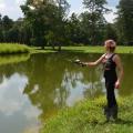 This young angler is actually helping an Oktibbeha County pond grow larger fish. Pond and lake managers need to harvest 1 pound of bass to 5 pounds of bream, usually beginning in the third year after stocking, to promote larger fish. (MSU Extension Service file photo/Linda Breazeale)