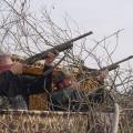 Two hunters in Claiborne County take aim at incoming crows. Much like duck hunting, participants wait in blinds overlooking decoys. (File photo by MSU Extension Service/Cliff Covington)