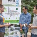 Mississippi State University senior landscape architecture student Owen Harris (left) speaks to Ranjit Amgai (center), an electrical engineering graduate student from Nepal, and Shengyi Pan, a computer engineering doctoral student from China, about the role of landscape architects in the environment. Landscape architects and students are celebrating National Landscape Architecture Month with outreach activities to promote their program and discipline. (Photo by MSU Ag Communications/Scott Corey)